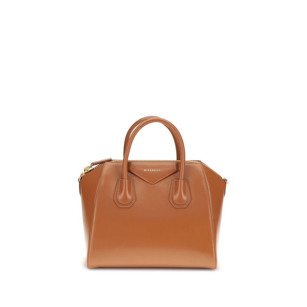 Givenchy Brown Calf Leather Bos Taurus Handbag with round handles and removable strap, glossy finish, logo, zipper closure, and interior pockets.