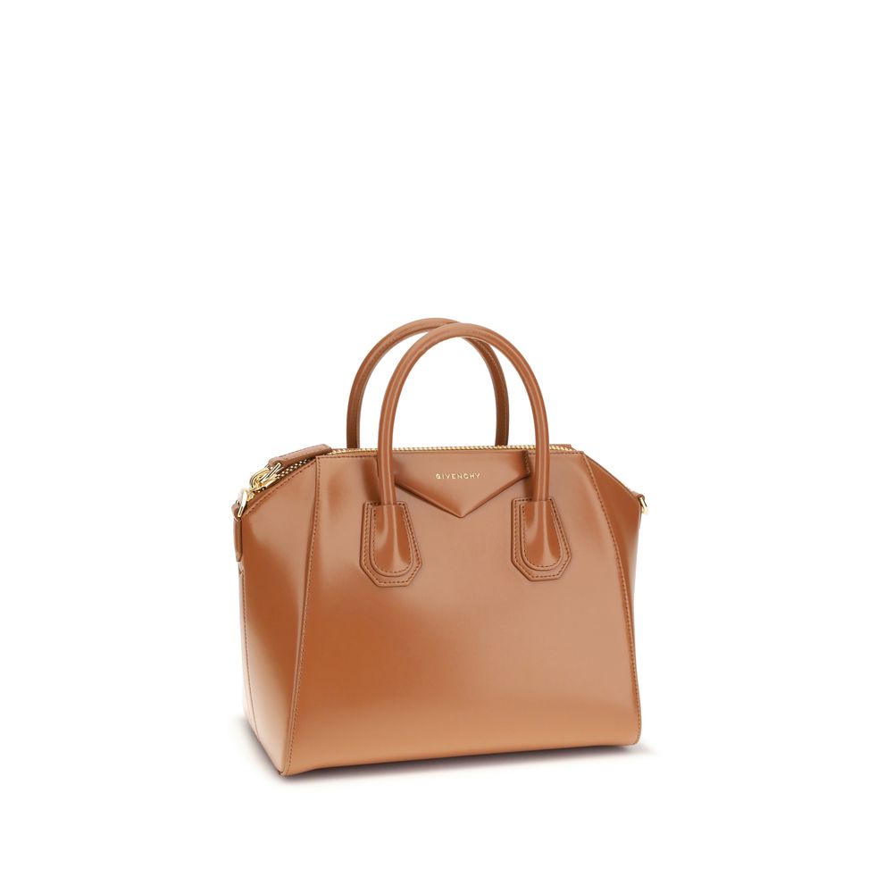 Givenchy Brown Calf Leather Bos Taurus Handbag with glossy finish and logo, featuring handles and shoulder strap, elegant design AW25 season.