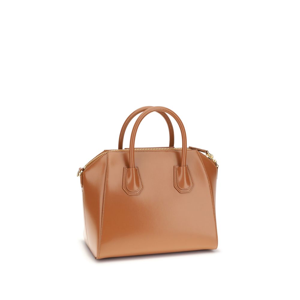 Alt Tag: Givenchy Brown Calf Leather Bos Taurus Handbag with glossy finish and removable shoulder strap.