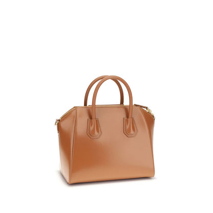 Alt Tag: Givenchy Brown Calf Leather Bos Taurus Handbag with glossy finish and removable shoulder strap.