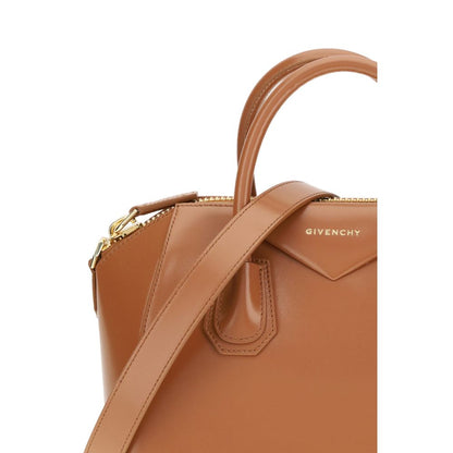 Givenchy Brown Calf Leather Bos Taurus Handbag with laminated logo and detachable strap.
