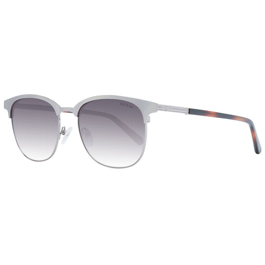 Guess Silver Metal Sunglasses for men with silver metal frame, grey gradient lenses, full-rim browline style, 100% UVA & UVB protection.