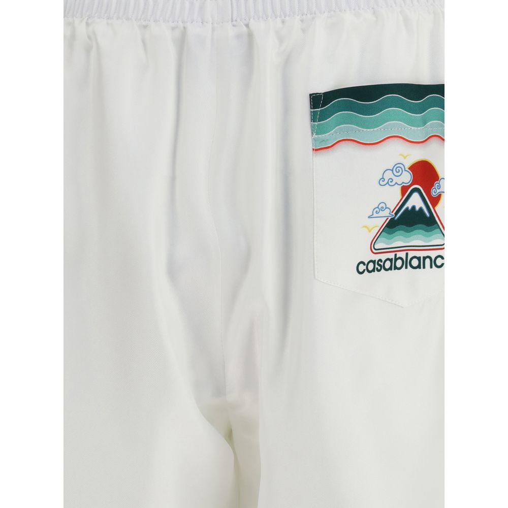 Casablanca White Silk Bermuda Shorts with Japanese-inspired print on pocket, featuring elasticated waistband and silk twill fabric.