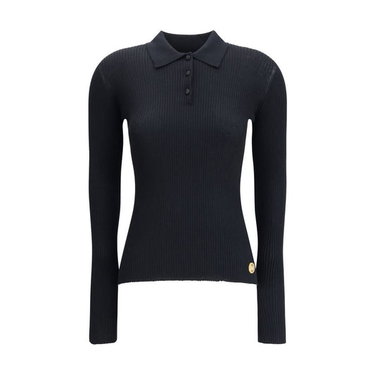 Dolce & Gabbana Black Cashmere Polo Shirt with ribbed design, classic collar, and three-button front for refined, versatile style.
