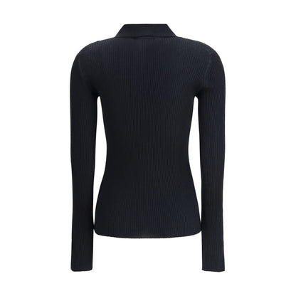 Back view of Dolce & Gabbana Black Cashmere Polo Shirt with ribbed design and classic collar for AW25 collection.