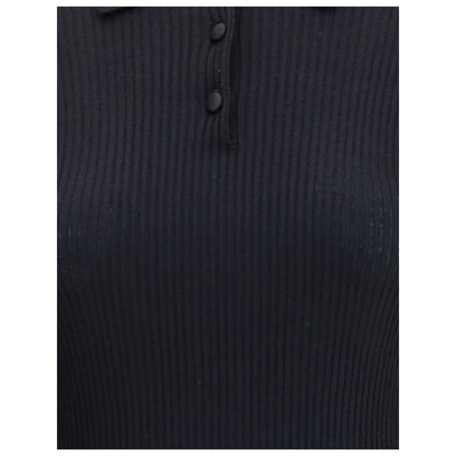 Dolce & Gabbana Black Cashmere Polo Shirt with ribbed texture and buttoned front, ideal for elegant and versatile styling, AW25 season.