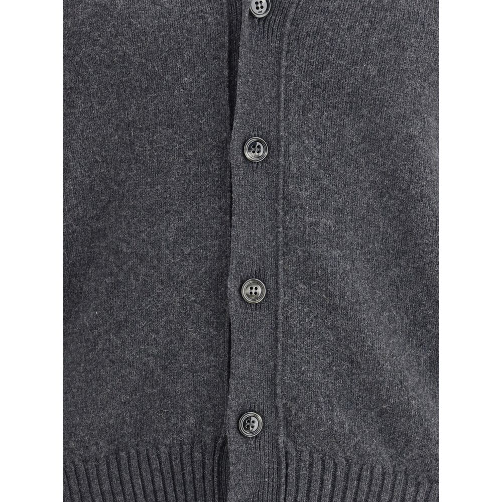 Close-up of Ami Paris Gray Cashmere Cardigan with button closure and ribbed hem detailing.