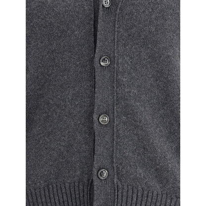 Close-up of Ami Paris Gray Cashmere Cardigan with button closure and ribbed hem detailing.