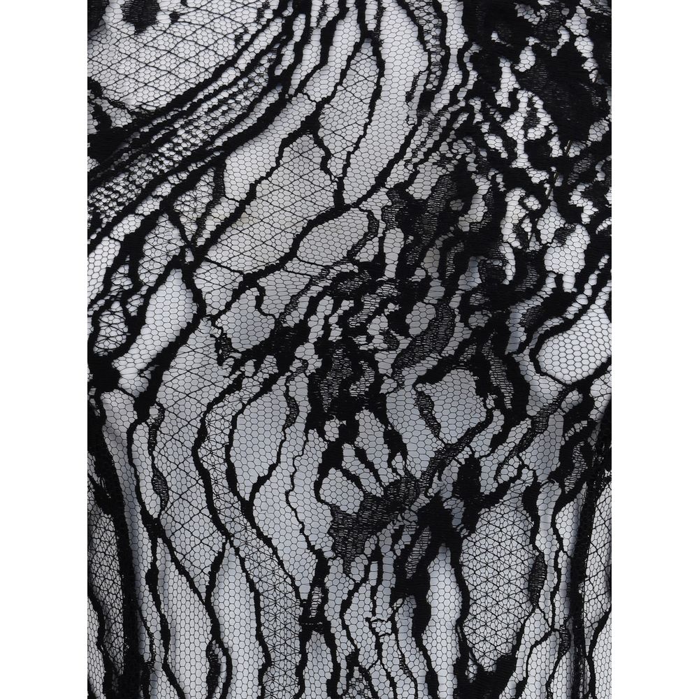 Close-up of sheer black lace fabric from Balmain Black Cotton Top with elegant and sophisticated design details.