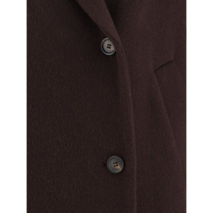 Close-up view of Brunello Cucinelli Bordeaux Cashmere Coat's double-breasted front and elegant peaked lapel.