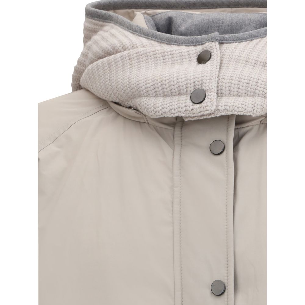 Close-up of Brunello Cucinelli Gray Polyester Coat with button closure and reversible hood showing knit and padded sides.