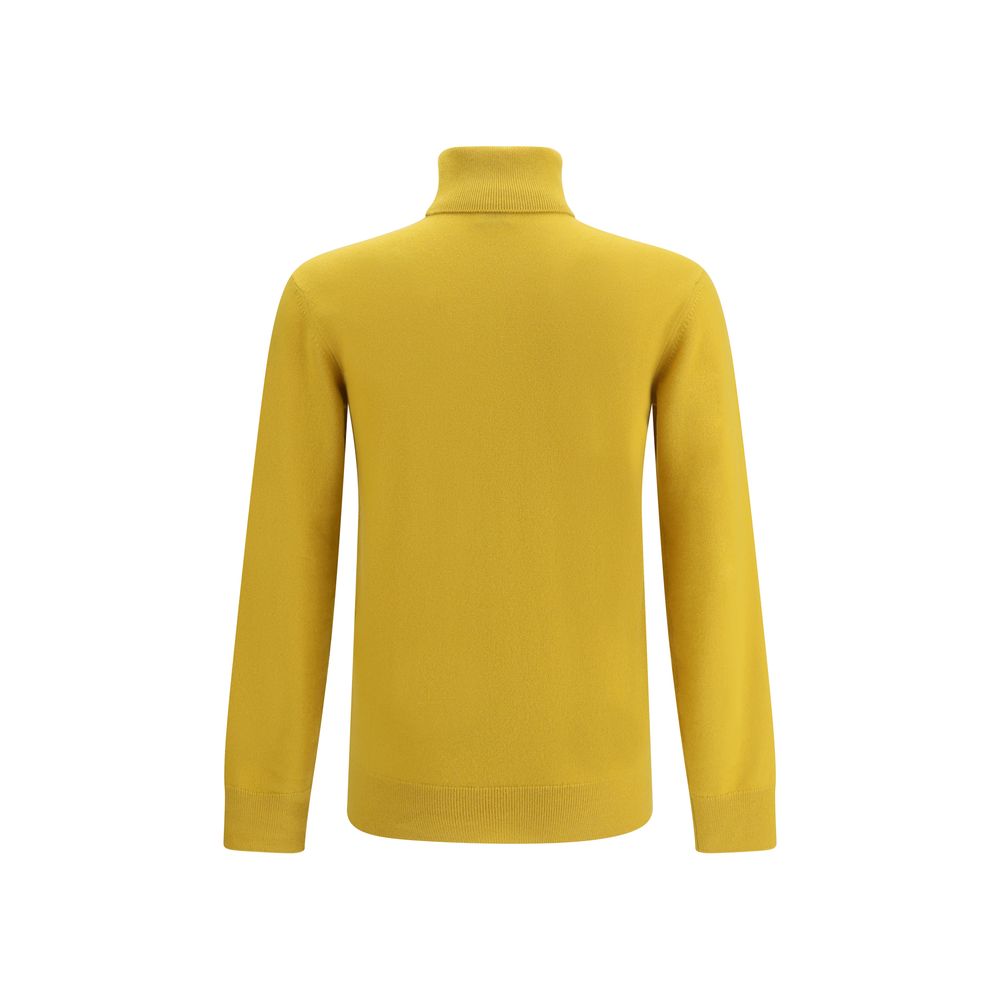 Back view of Saint Laurent Yellow Cashmere Turtleneck showcasing ribbed collar and cuffs.