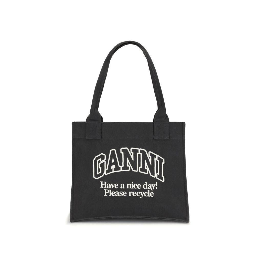 Ganni Black Cotton Shoulder Bag with recycled cotton interior, featuring "GANNI" logo and sustainability message "Have a nice day! Please recycle."