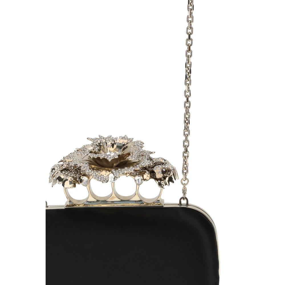 Alexander McQueen Black Silk Clutch Bag with crystal carnation knuckle handle and gold-finish chain.