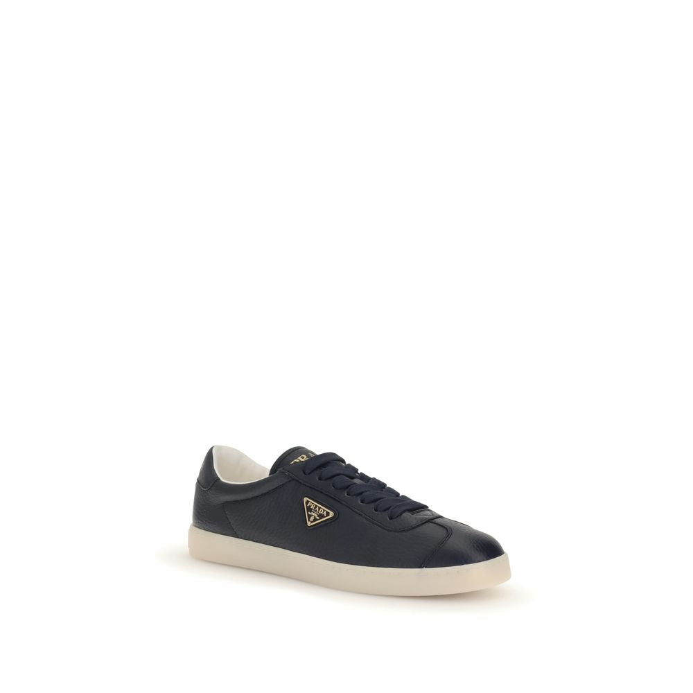 Prada Blue Calf Leather Bos Taurus Low Top Sneakers with embossed logo and rubber sole, featuring lace-up style and padded ankle.