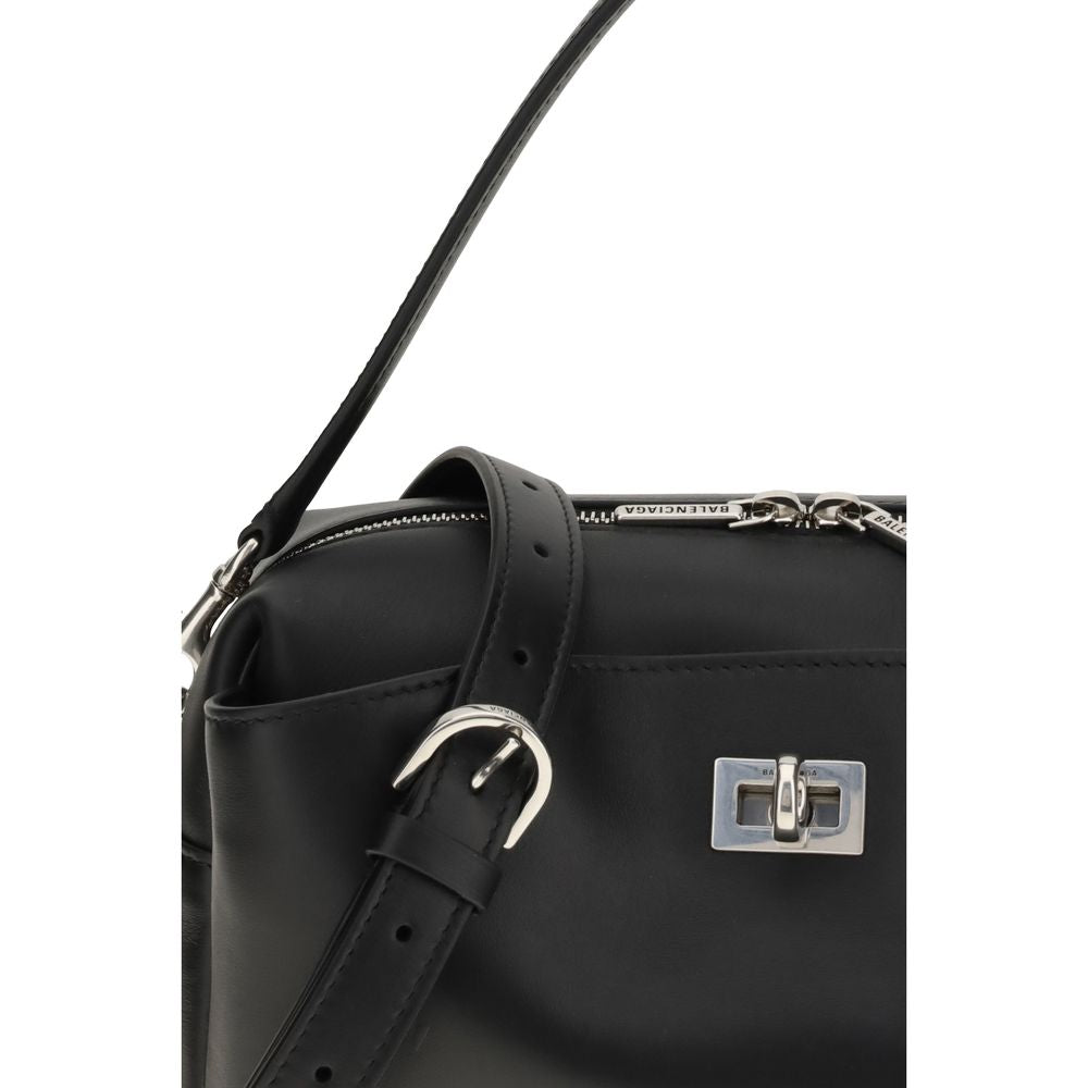 Close-up of Balenciaga Black Calf Leather Bos Taurus Shoulder Bag with silver hardware and adjustable strap.