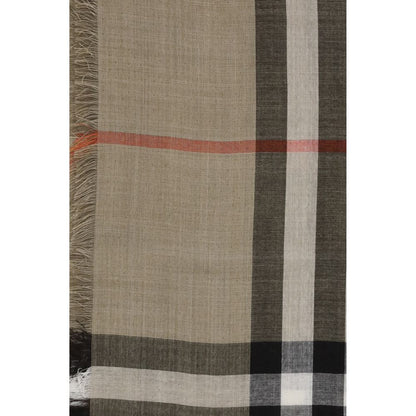 Close-up of Burberry Beige Wool Scarf featuring distinctive check print in sand and brown tones with fringed edges, made in Italy.