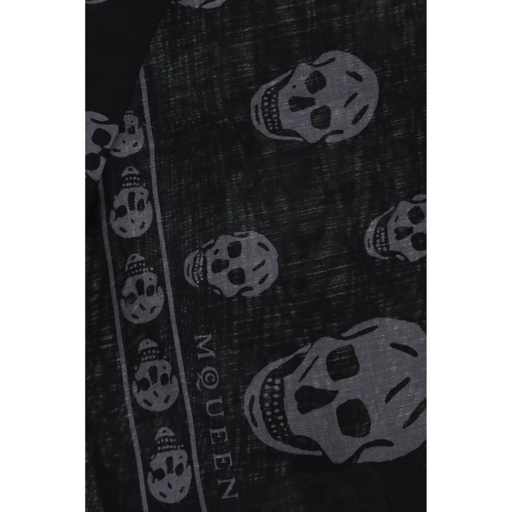 Alexander McQueen Black Modal Scarf featuring skull motif and fringed edges, made from silk and modal blend in black and dark grey.