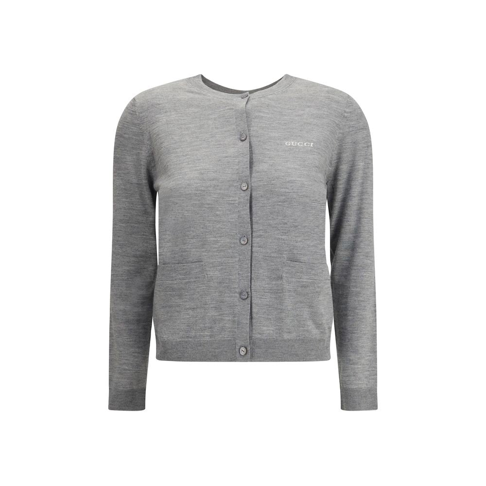 Gucci Gray Cashmere Cardigan with ribbed crew neck, front button closure, two patch pockets, and signature logo, perfect for AW25.