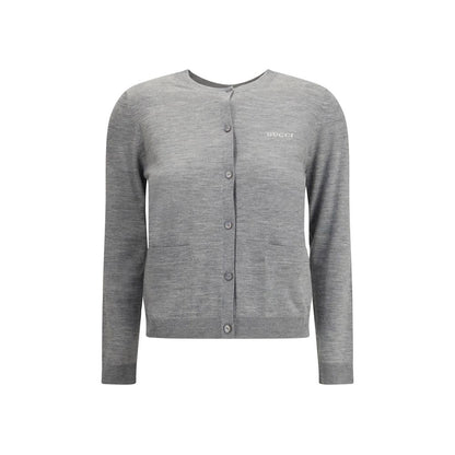 Gucci Gray Cashmere Cardigan with ribbed crew neck, front button closure, two patch pockets, and signature logo, perfect for AW25.