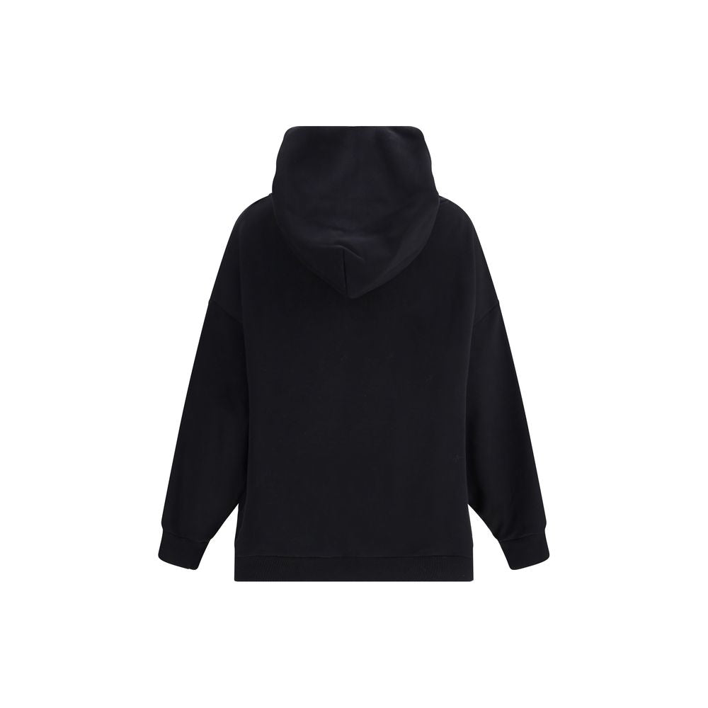Back view of Givenchy Black Cotton Sweatshirt with hood and ribbed cuffs, highlighting modern design and oversized fit.