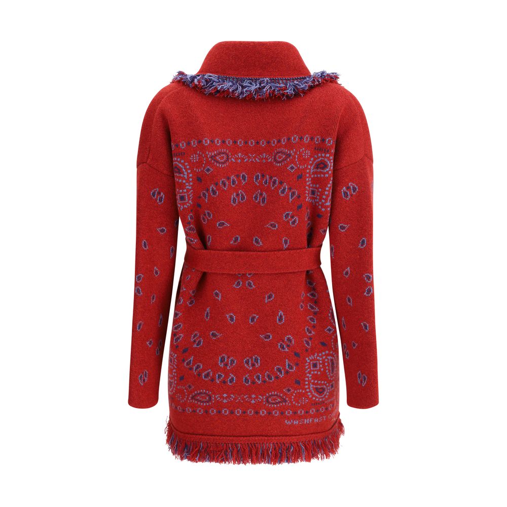 Back view of Alanui Bordeaux Cashmere Cardigan with Bandana jacquard pattern, fringed edges, and two-tone waistband in red and blue.