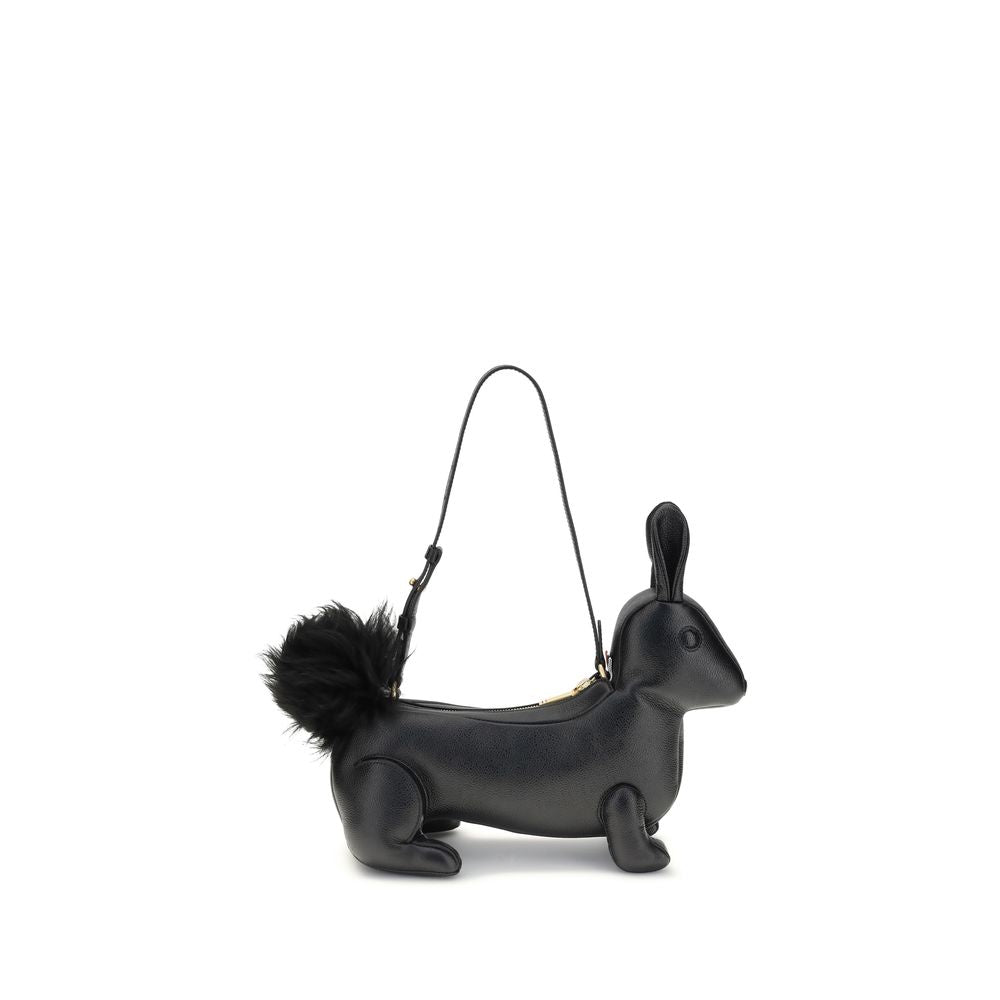 Thom Browne Black Calf Leather Bos Taurus Shoulder Bag in rabbit shape with fur tail and brass zipper closure.