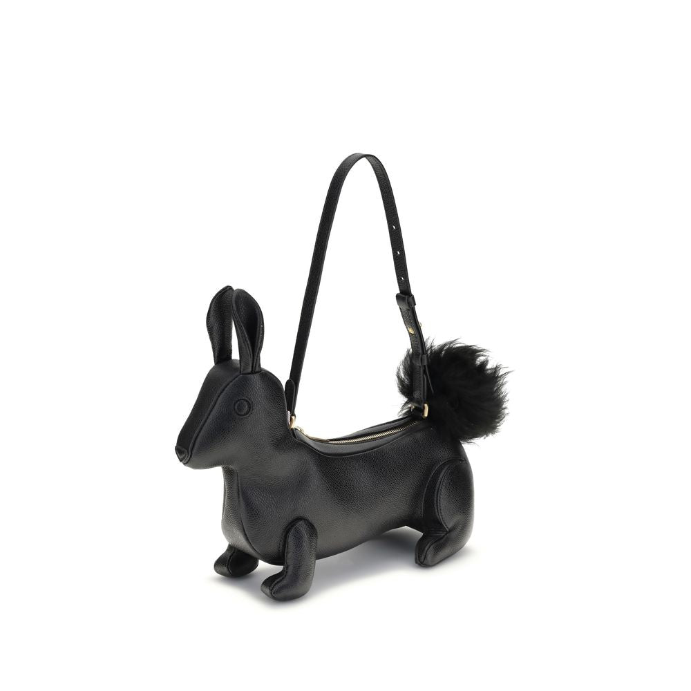 Thom Browne Black Calf Leather Bos Taurus Shoulder Bag, rabbit-shaped with fur tail and brass zipper, showcasing unique craftsmanship.