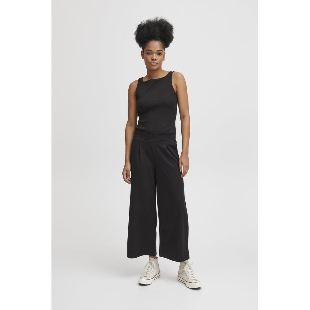 Woman wearing ICHI Black Recycled Polyester Flared Pants with a modern, comfortable design.