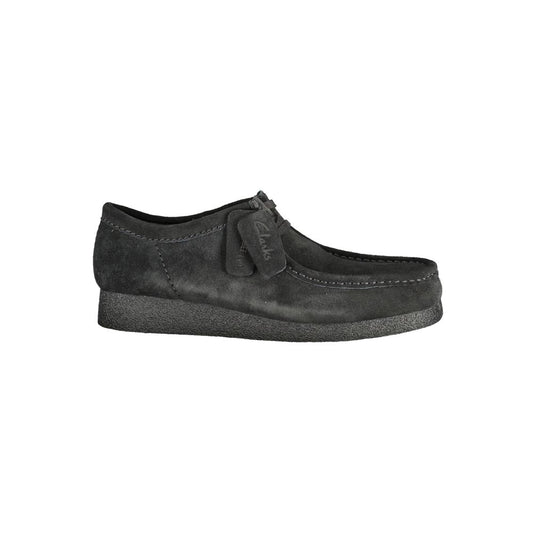 Clarks Black Leather Men Sneaker with suede finish and removable footbed, versatile for stylish streetwear.