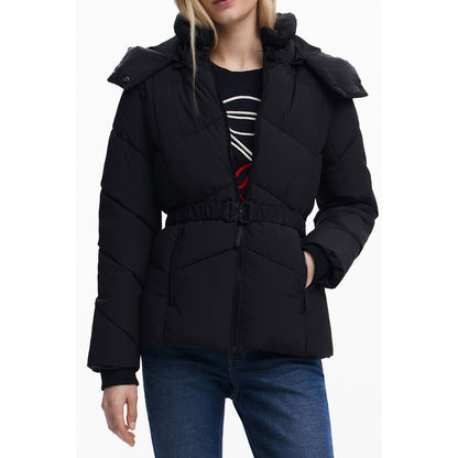 Woman wearing Desigual Black Polyester Women Jacket with removable hood and waist belt, showcasing elegant and practical style.