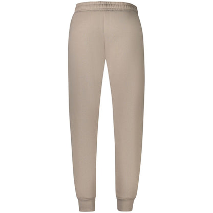 Alt Tag: Norway 1963 Beige Cotton Pant with fleece fabric, elastic waist and ankle cuff, featuring 2 pockets and logo embroidery.