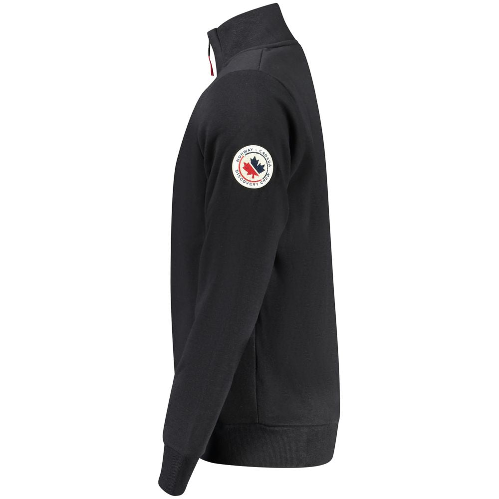 Norway 1963 Black Cotton Sweatshirt with long sleeves, two zip pockets, applique logo, side view.