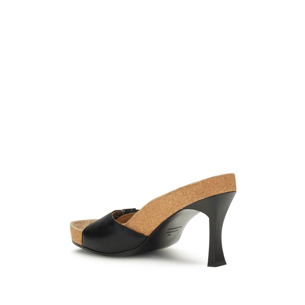 Balenciaga Black Calf Leather Bos Taurus Stiletto Heel Sandals with ergonomic design, cork-covered sole, and adjustable buckle.