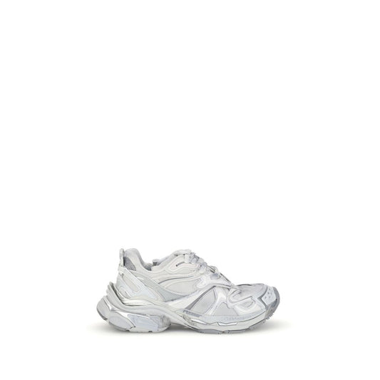Balenciaga Silver Rubber Athletic Sneakers with worn-in effect and embossed details illustrating grunge aesthetic.