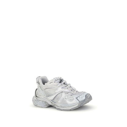 Balenciaga Silver Rubber Athletic Sneakers with worn-in grunge style, featuring embossed and printed logos, and a handy back loop.