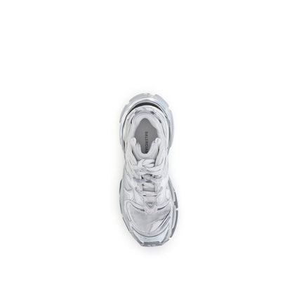 Top view of Balenciaga Silver Rubber Athletic Sneakers showing worn-in design and logo details.
