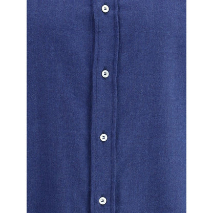 Brunello Cucinelli Blue Cotton Dress Shirt with front button closure and monochrome pattern, showcasing classic and versatile elegance.