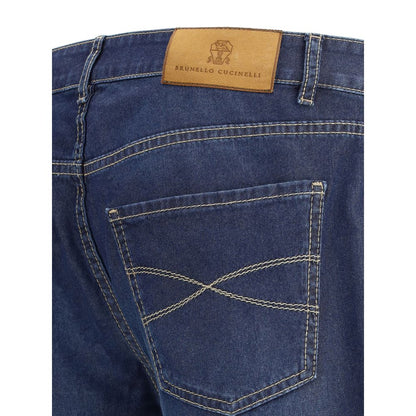 Brunello Cucinelli Blue Cotton Relaxed Fit Jeans with leather patch detail on back pocket for SS25 collection.