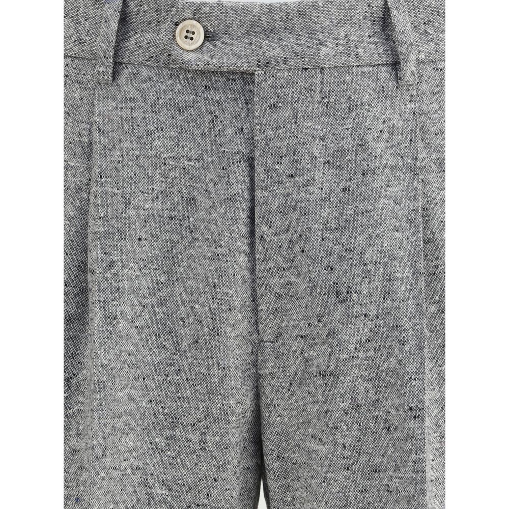Close-up of Brunello Cucinelli Gray Wool Two-Piece Suit trousers with button detail.