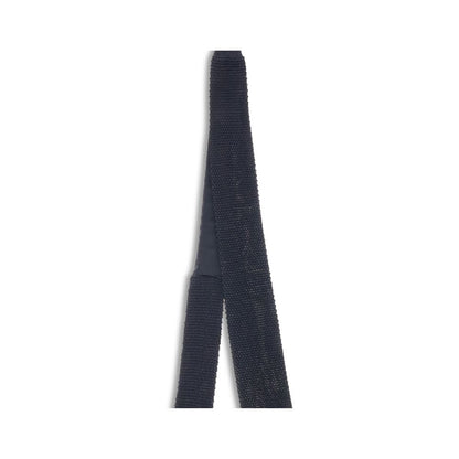 Brunello Cucinelli Knitted Tie in fine silk, showing unique texture and luxurious design, perfect for formal wear. Made in Italy.