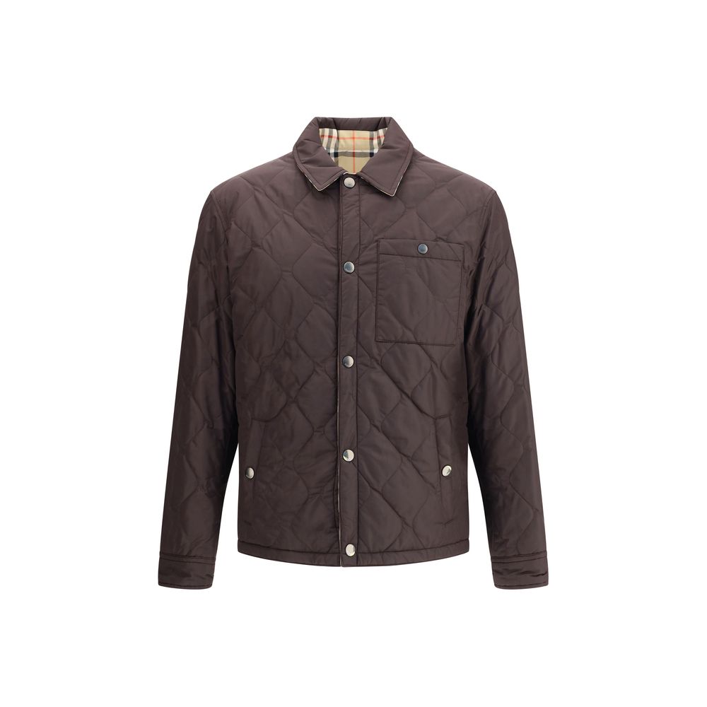 Burberry Brown Polyamide Coat with reversible quilted design, pointed collar, chest pocket, and Burberry Check inner lining.