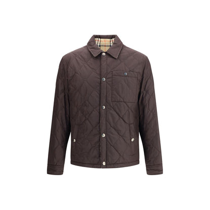 Burberry Brown Polyamide Coat with reversible quilted design, pointed collar, chest pocket, and Burberry Check inner lining.