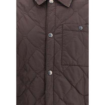 Close-up view of Burberry Brown Polyamide Coat showing quilted design, snap button closure, and chest pocket.
