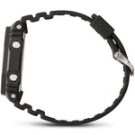Side view of CASIO G-SHOCK Mod. OAK Black wristwatch showcasing its black resin strap and multifunction features.