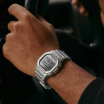 Man wearing CASIO G-SHOCK Mod. THE ORIGIN - FORGOTTEN FUTURE SERIE wristwatch, water-resistant resin case.