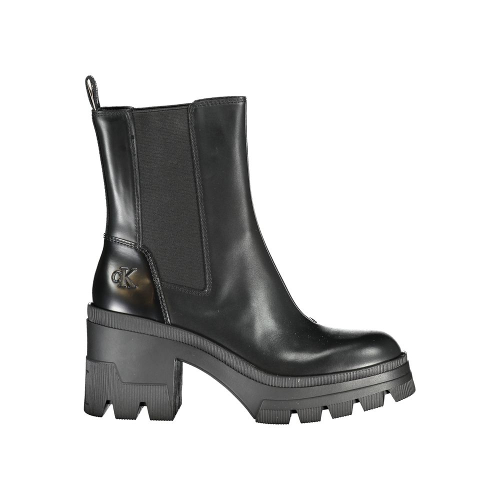 Calvin Klein Black Leather Women Boot with 8 cm heel and iconic logo, showcasing sophistication and chic style.