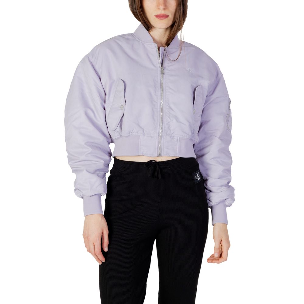 Model wearing Calvin Klein Jeans Purple Polyamide Bomber with cropped cut and front zip closure, showcasing contemporary fashion style.