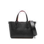 Christian Louboutin Cabata mini leather tote bag in black with spiked stud embellishments and detachable shoulder strap.