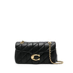 Black quilted Coach Tabby shoulder bag with gold-tone logo and chain strap.